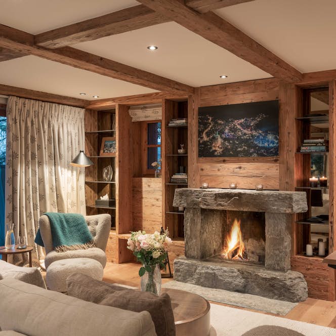 accommodation - Chalet Feuillu - Open plan living area with view and fireplace